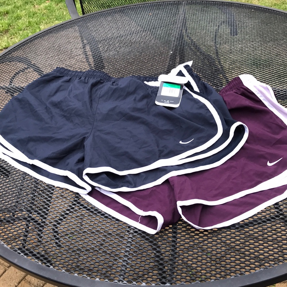 2 pairs of brand new Nike running shorts